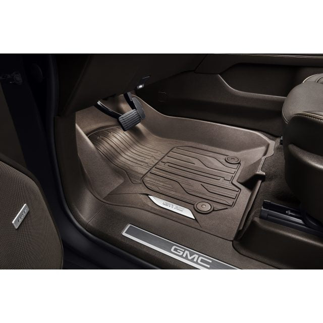 GMC 2024 Yukon First-Row Premium All-Weather Floor Liners in Very Dark Atmosphere with Chrome GMC Logo 84776602