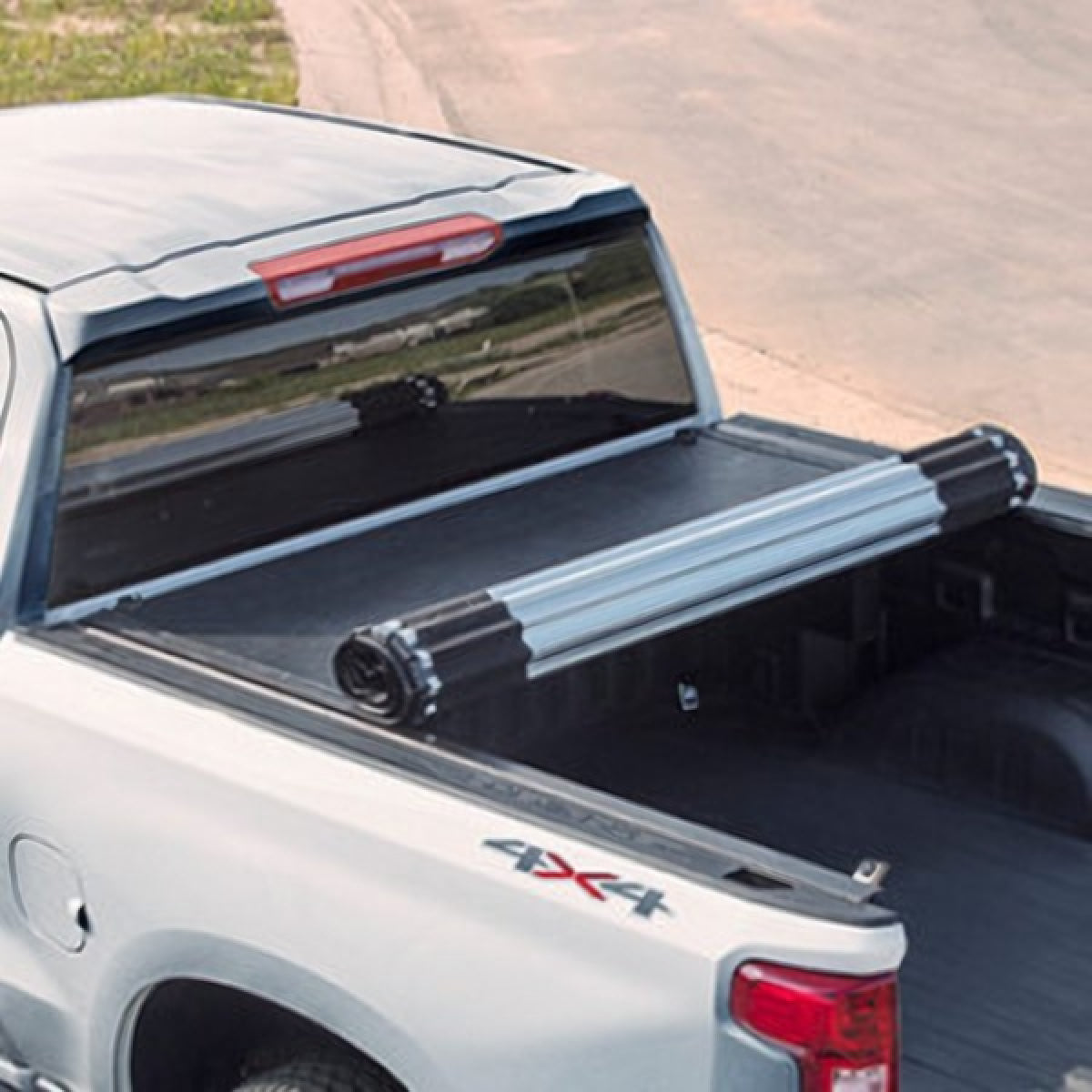 GMC Tonneau Cover - Associated Accessories, Hard Rolling, REV for 2019-2023 Chevrolet Silverado 1500  19416967